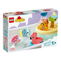 Colorful LEGO® DUPLO® Floating Animal Island playset, featuring a lion, flamingo, fish, and octopus, splashing in water with a tree on an island.