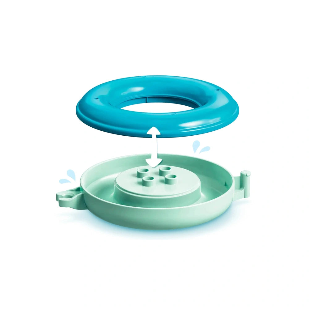 Floating animal island construction set featuring a turquoise ring and a mint green base with water splash effects.