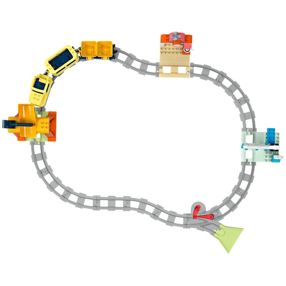 Colorful Lego Duplo Big Interactive Community Train set featuring a winding track, train station, and toy train cars, perfect for preschool creativity and play.