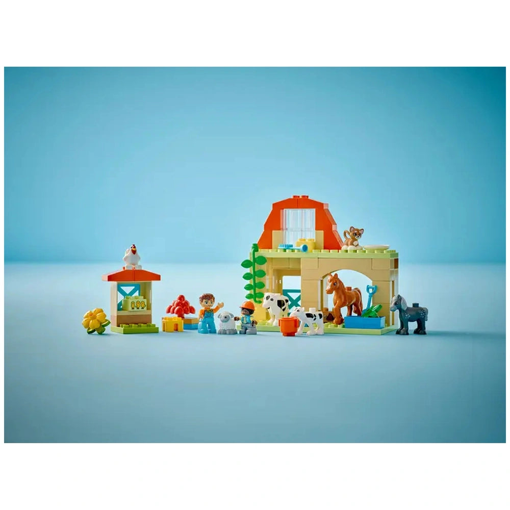 Colorful LEGO® DUPLO® farm set featuring a barn, animals like a horse and cow, and two children interacting joyfully.