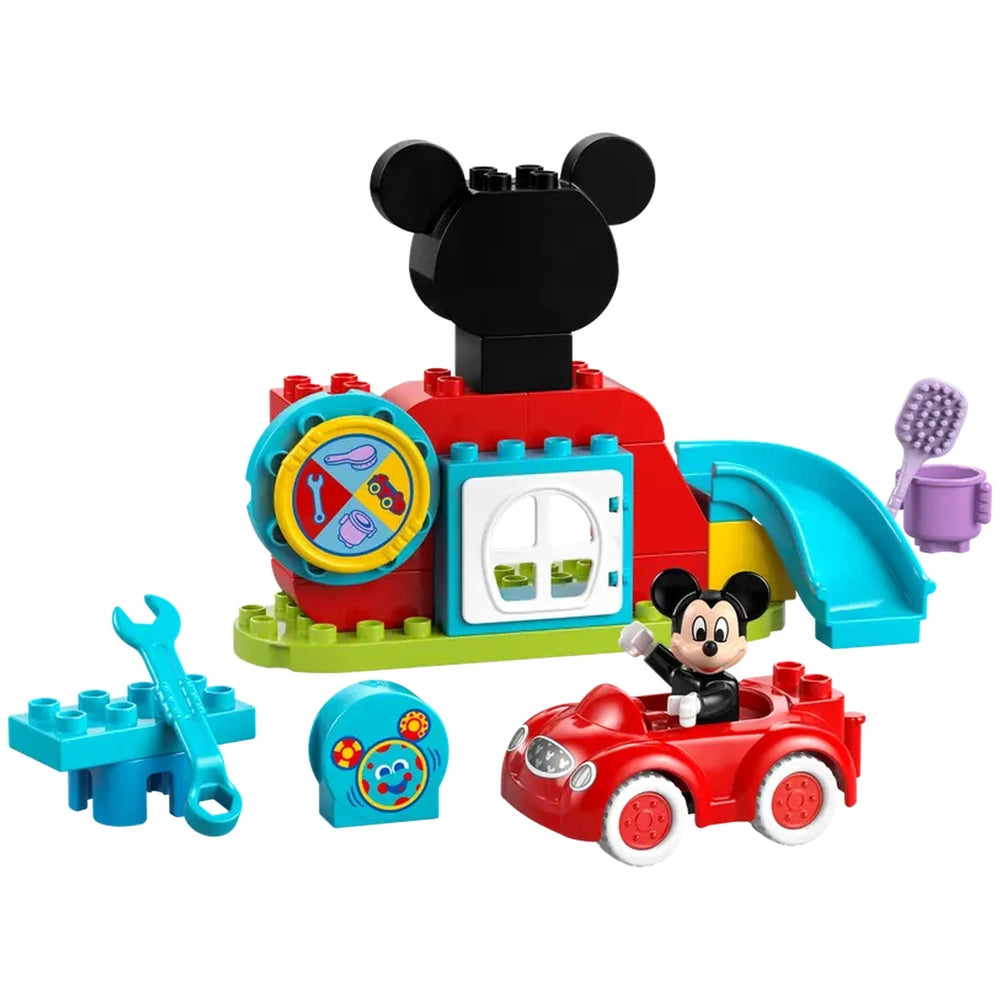 Colorful LEGO® DUPLO® Mickey Mouse Clubhouse set featuring a red slide, a black Mickey Mouse figure in a red car, and various playful accessories.