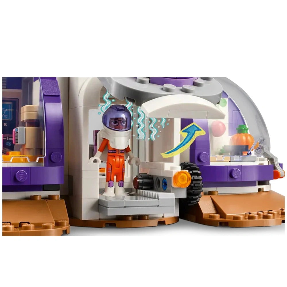 Purple modular Mars Space Base featuring an astronaut mini-doll in an orange suit, with a rocket and research area in the background.
