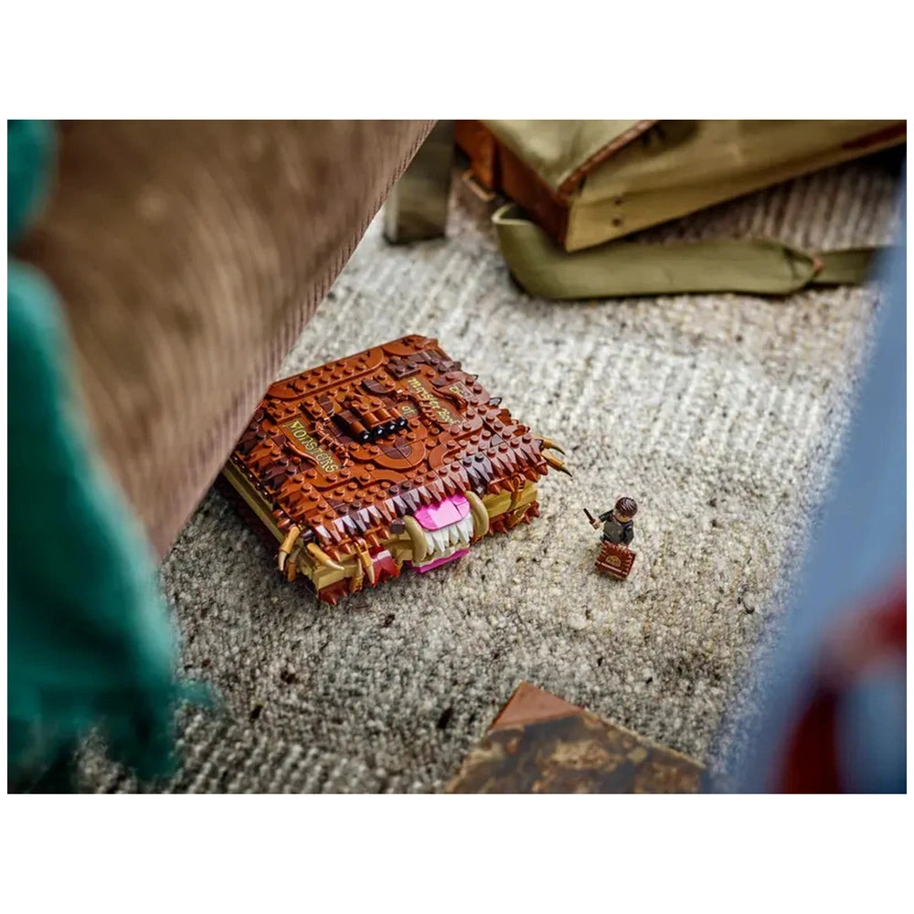 LEGO Harry Potter Chomping Monster Book of Monsters set on a textured surface, featuring brown and pink colors with a small figurine nearby.