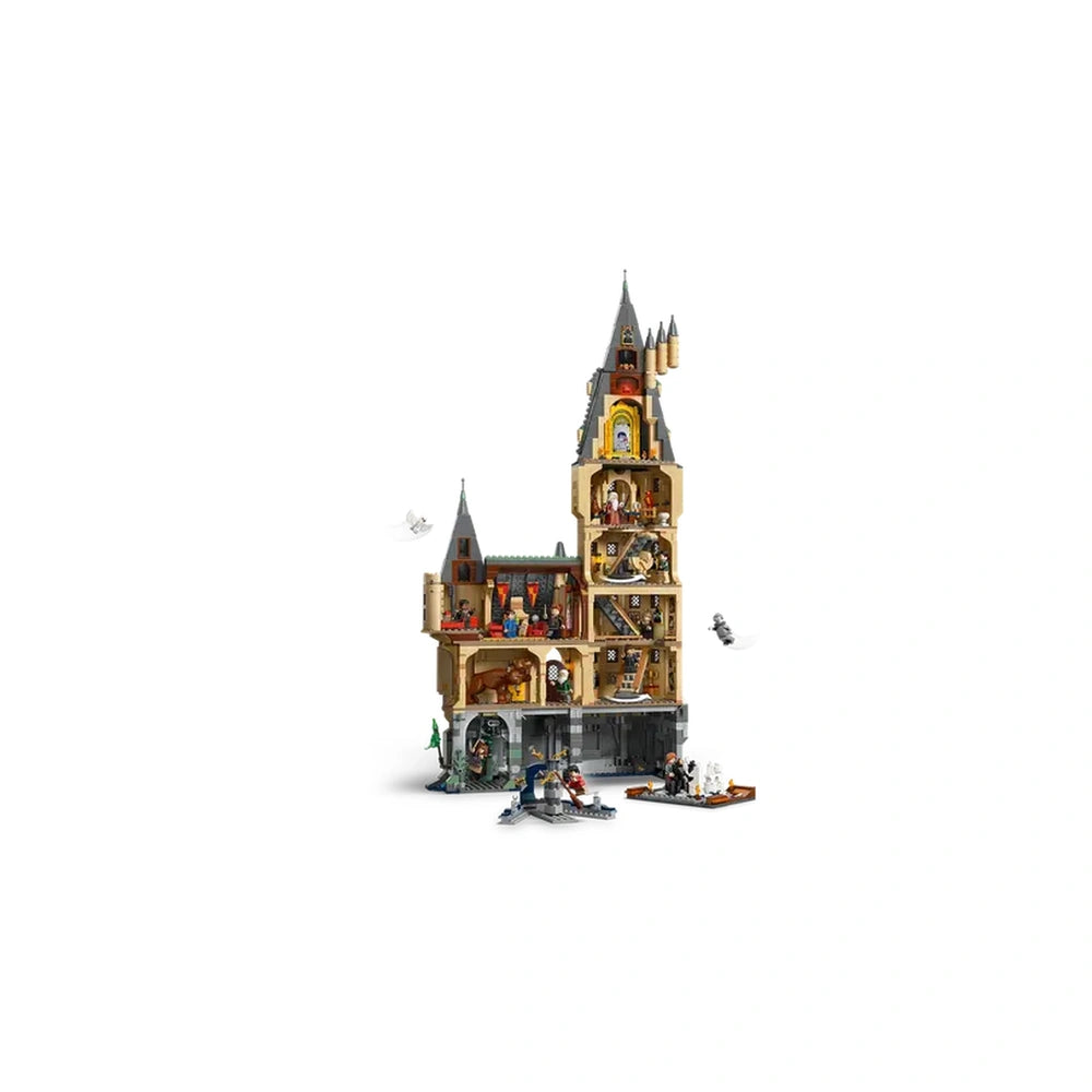 LEGO Harry Potter Hogwarts Castle set displayed in a three-dimensional perspective, showcasing intricate interior details, characters, and iconic features like the Grand Staircase and Fluffy's room.