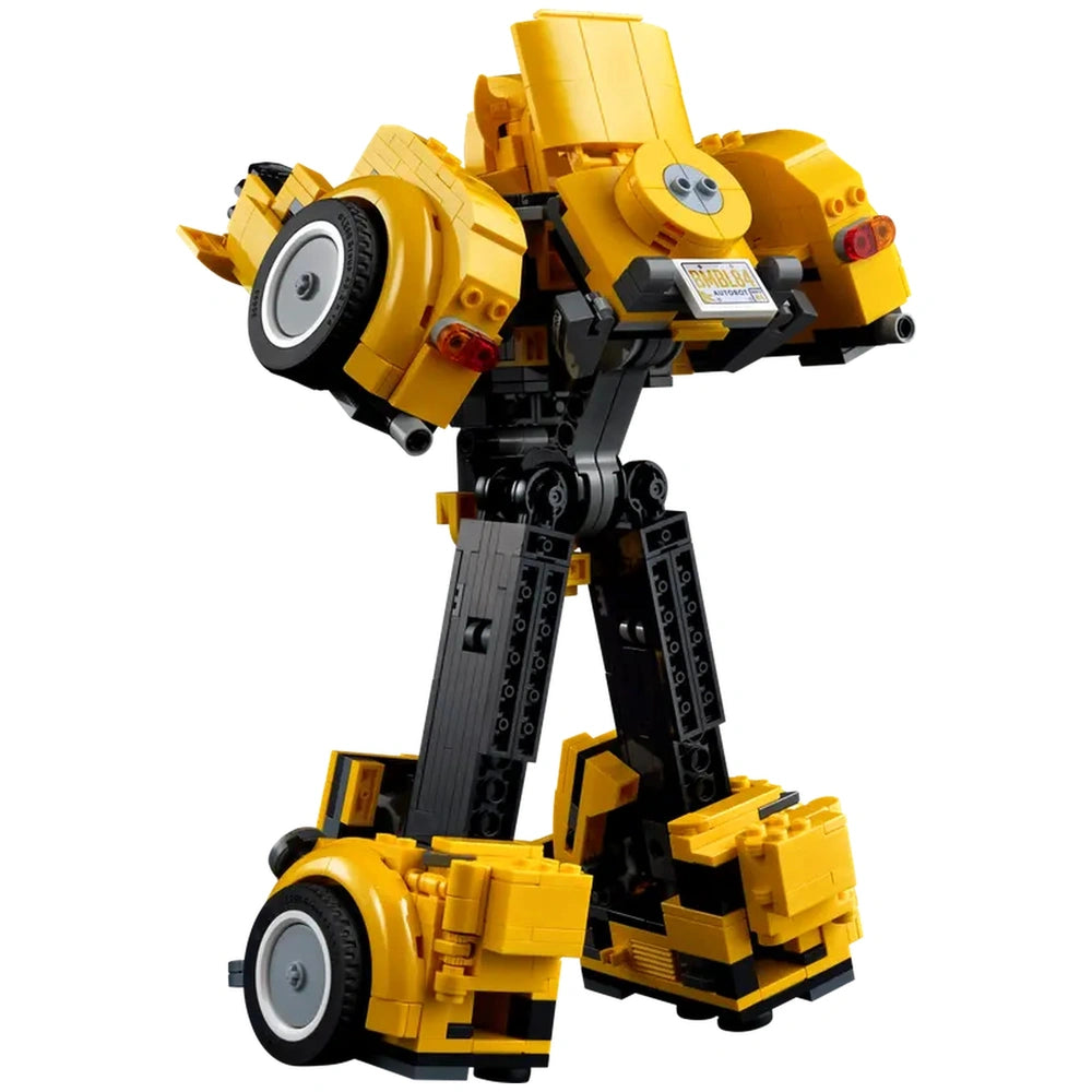 LEGO® Icons Transformers Bumblebee in robot form, showcasing bright yellow and black details, articulated joints, and iconic features like a jetpack and ion blaster.