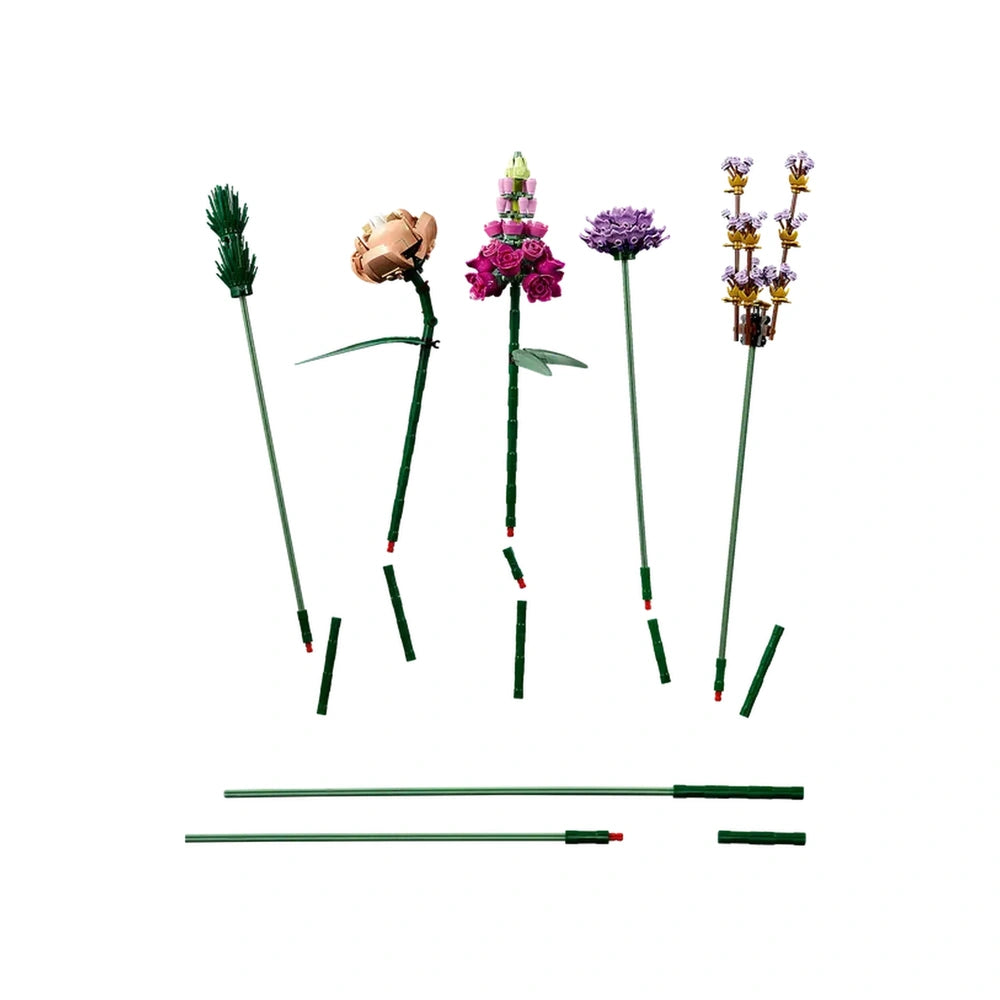 Colorful LEGO flowers including a rose, snapdragon, poppy, aster, and daisy, each with green adjustable stems, set on a white background.