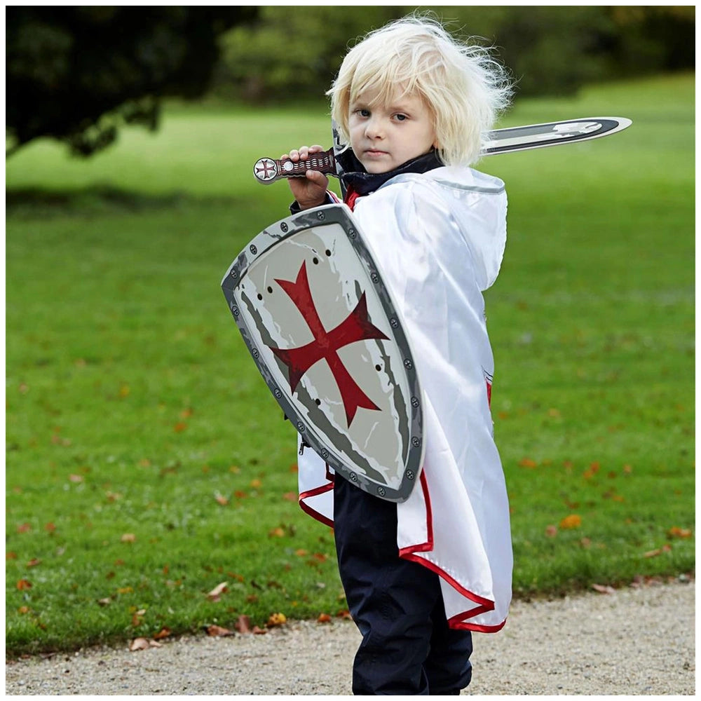 Liontouch Maltese sword held by a child in a silver and black helmet, white and red costume, and black pants in a playful sce