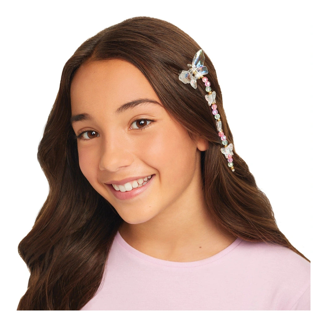Butterfly Jewelry Set displayed on a young girl with long brown hair, wearing a pink top and a butterfly hair accessory.