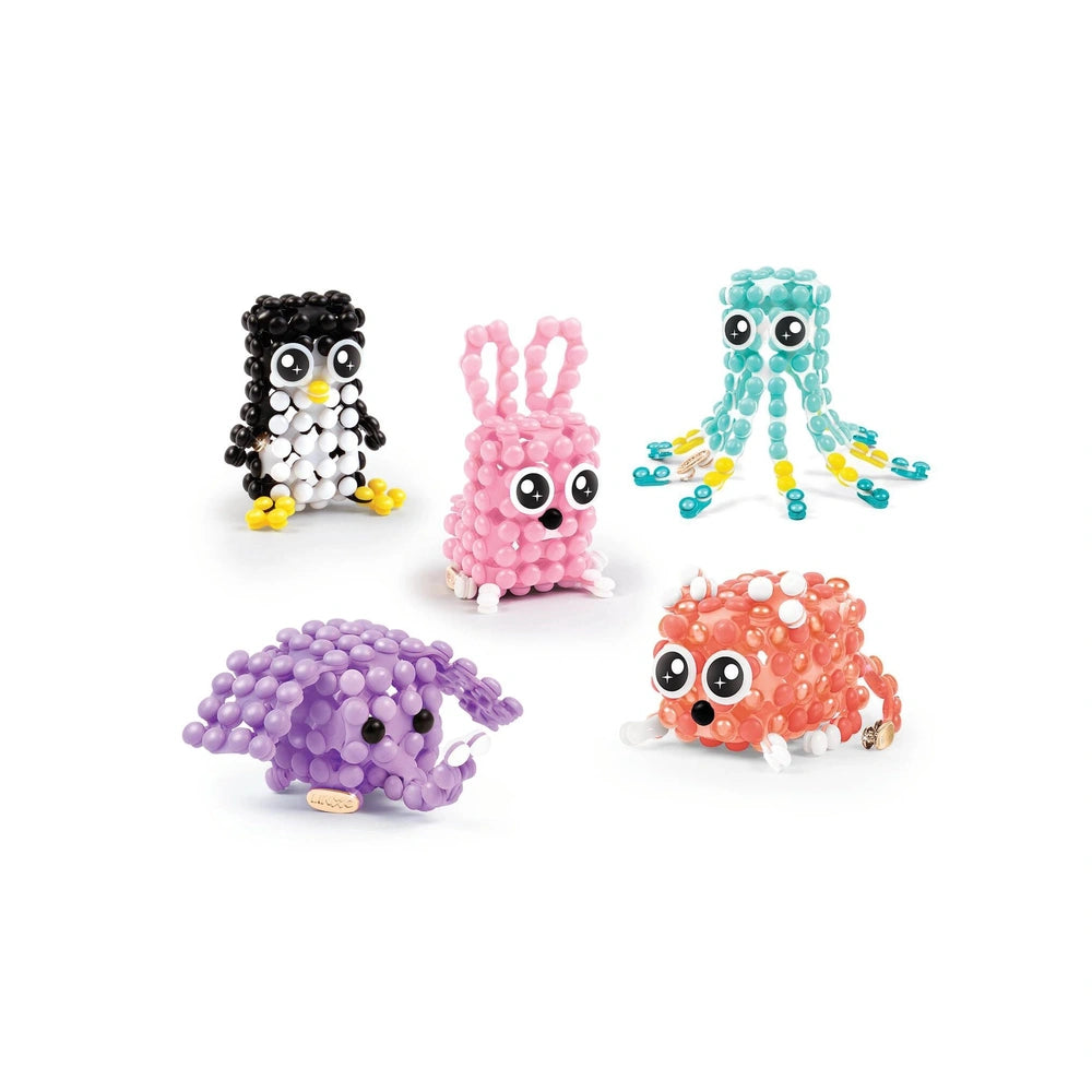 LINXO Character arts and crafts set featuring five colorful plastic objects in pink, purple, and orange on a light background