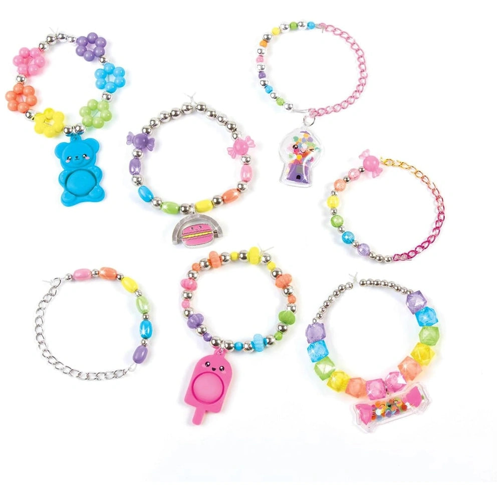 Pop Shake Twist Bracelet Set featuring colorful plastic bracelets with bear-shaped charms and visible beads.