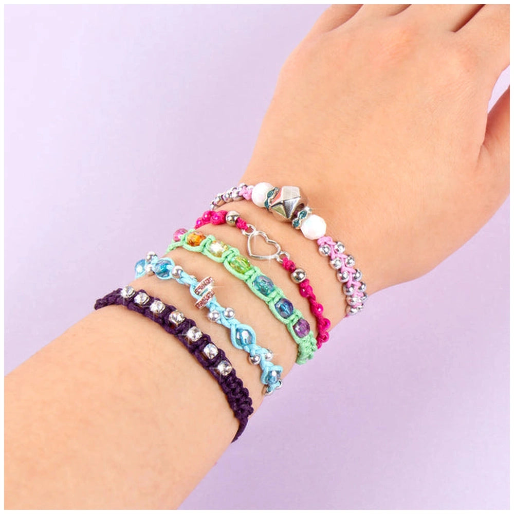 Rainbow Bling Bracelets featuring smooth, shiny beads in blue, pink, green, and white with metal clasp and charms.