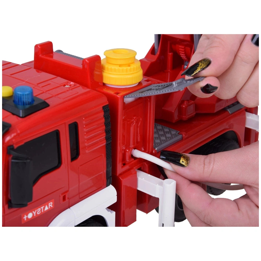 Red toy fire engine with a yellow top and white bumper, being assembled with a screwdriver by a person with dark nails.