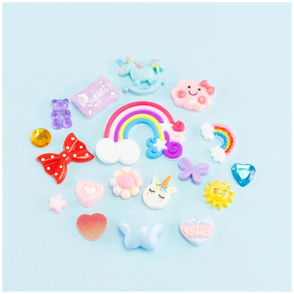 Momomi Decoden Kawaii Artist Creamy Phone Cover Starter Pack featuring colorful plastic, rubber, and metal embellishments.