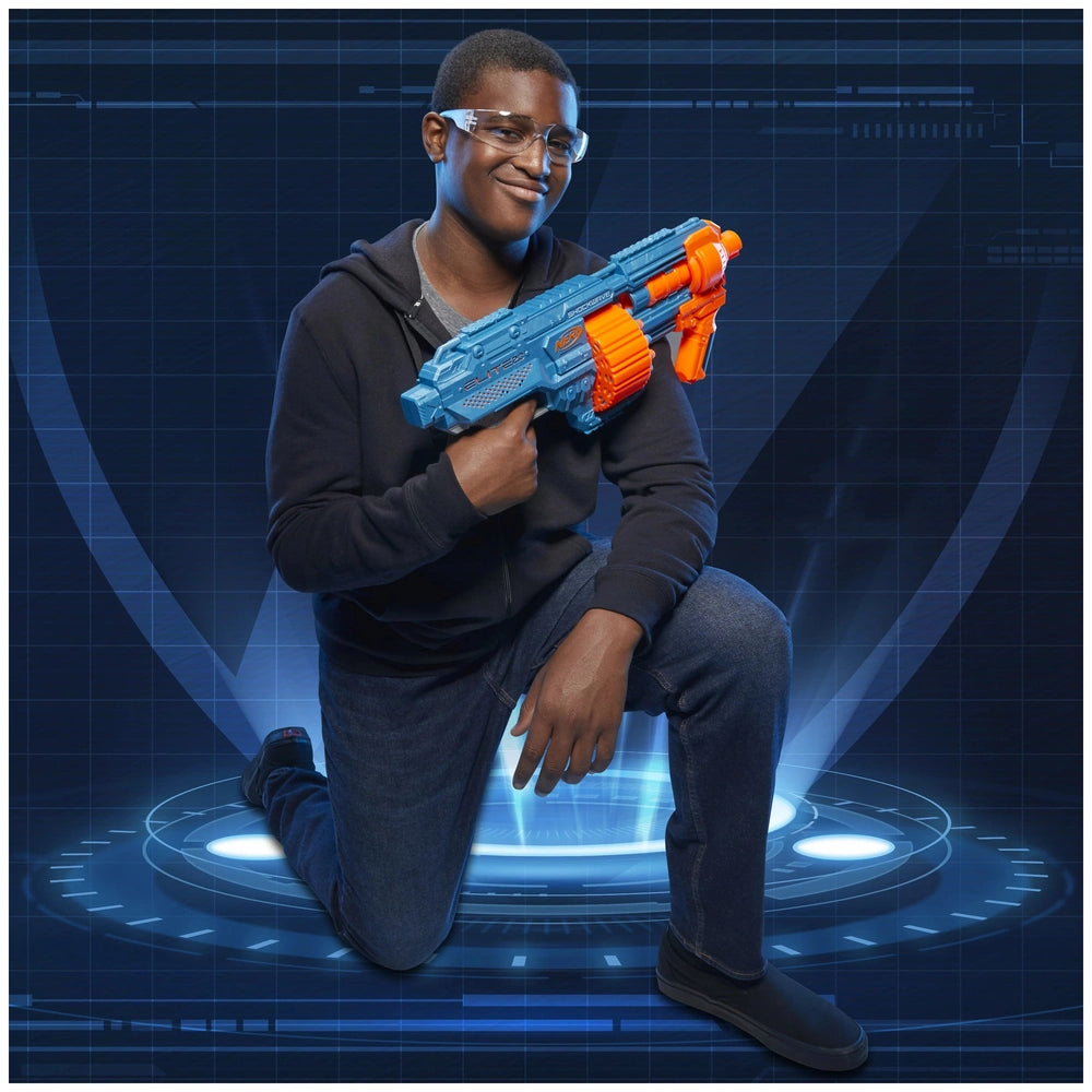 Nerf Elite 2.0 Shockwave RD-15 Blaster held by a person in a black hoodie against a blue grid background.