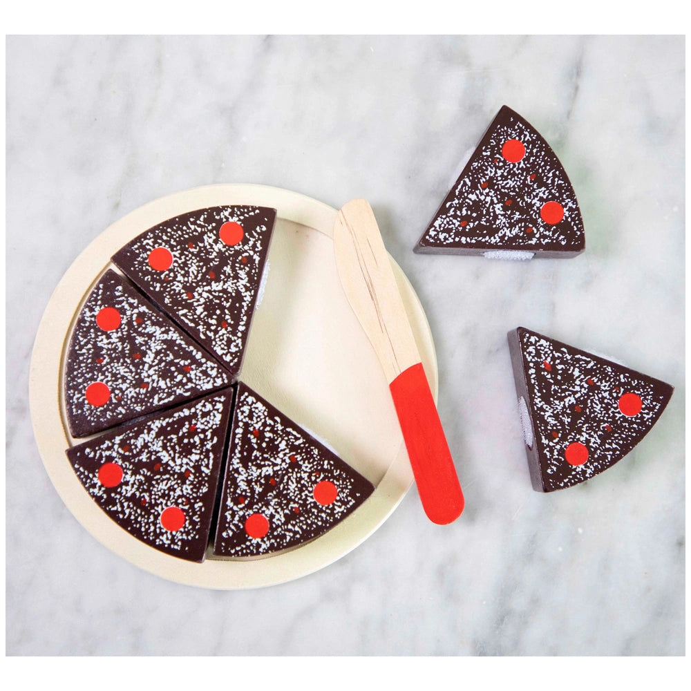 New Classic Toys cutting cake set features a glossy chocolate pizza on a white plate with a wooden-handled pizza cutter.