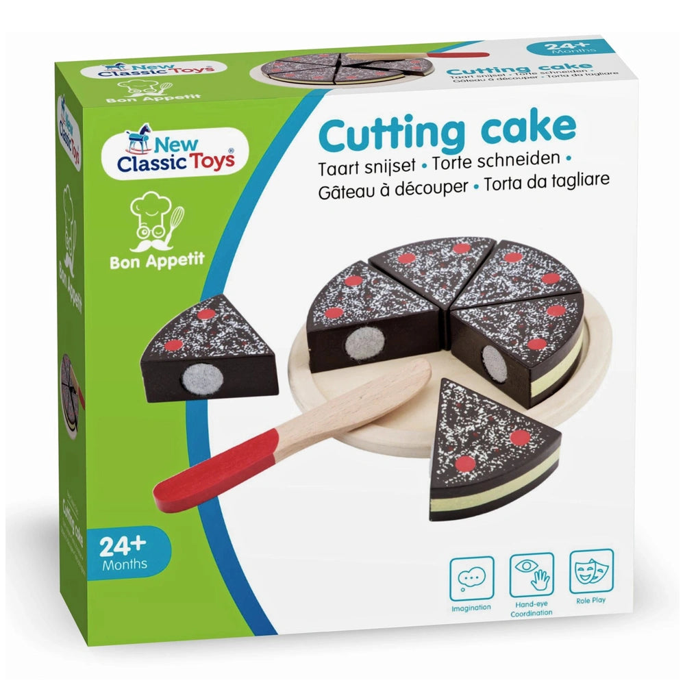 New Classic Toys Cutting Cake set featuring black and white patterned cake, red-handled spatula, and colorful cardboard packa