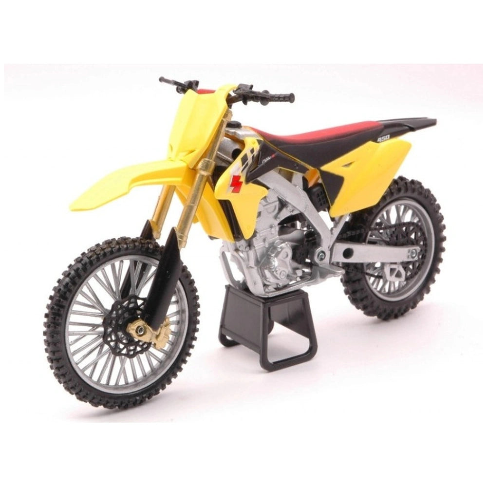New Ray Japan Dirt Bikes 1:12 die cast motorcycle with a yellow body, matte black frame, and black wheels.