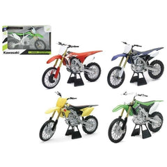 New Ray Japan Dirt Bikes 1:12 die cast model in glossy white packaging with green and black accents featuring "KAWASAKI" text