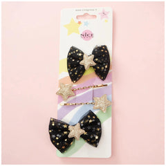 Classy ribbon hair clip set featuring black bows with gold stars, displayed in matte cardboard packaging with a clear window.