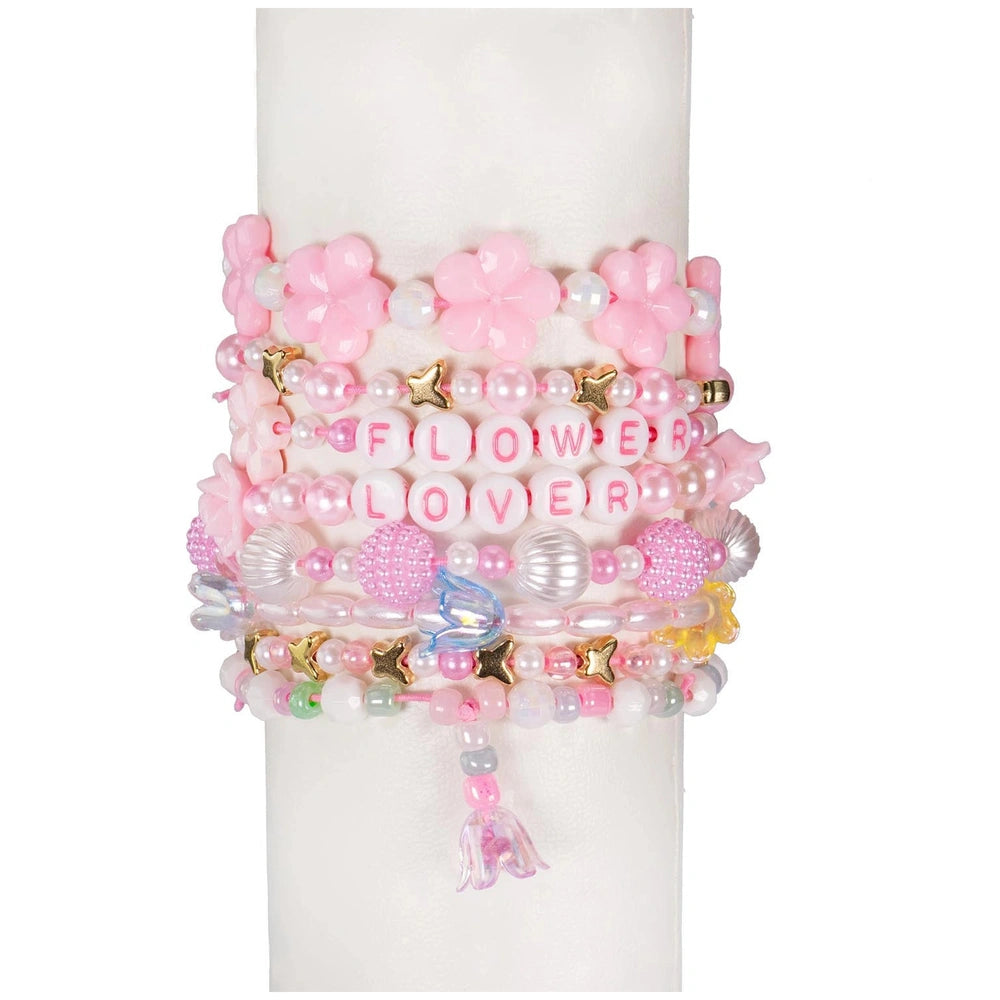 Crea-ABC-Beads-Flower-Bouquet kit features colorful pink, white, yellow, and green beads arranged in a vibrant display.