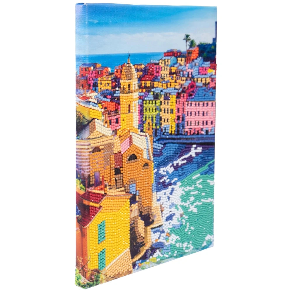 Diamantiny Artist Level Up painting on glossy canvas features a vibrant, pixelated cityscape with colorful buildings and a cl