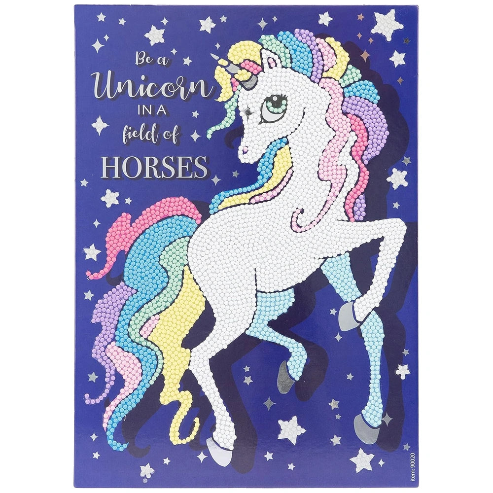 Diamantiny Crystal Art Design Set featuring a white unicorn on a blue background with glittery stars and inspiring text.