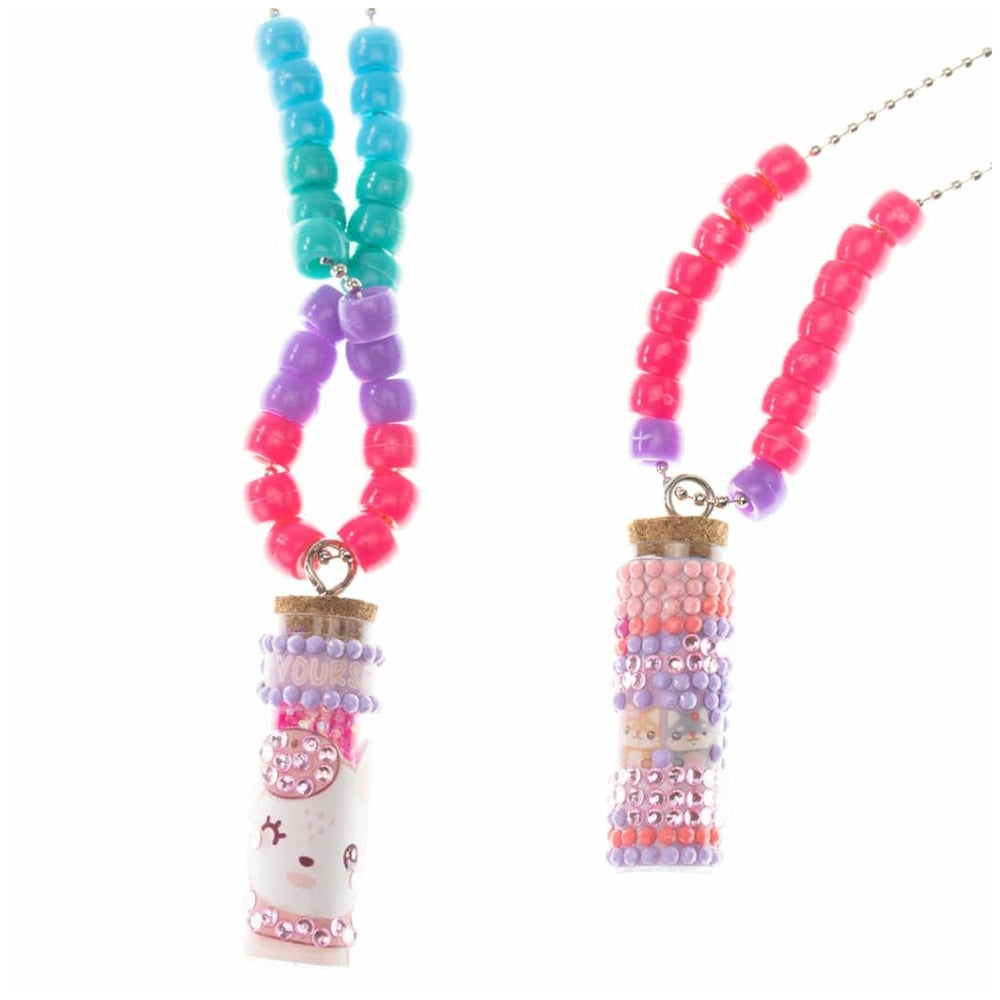 Diamantiny Deco Charms Set features a cylindrical object with glossy pink, purple, and blue plastic beads strung on a metalli