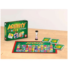 PIATNIK Activity Compact board game with glossy green and yellow box, matte plastic pieces, colorful game board, and timer.