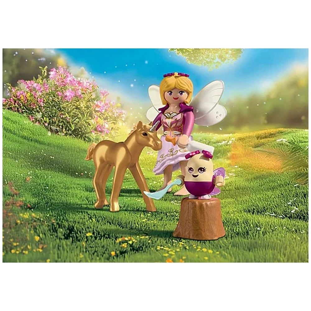Playmobil Magic Unicorns playset features a gold horse, pink-dressed fairy, brown mushroom, and colorful flowers on green gra