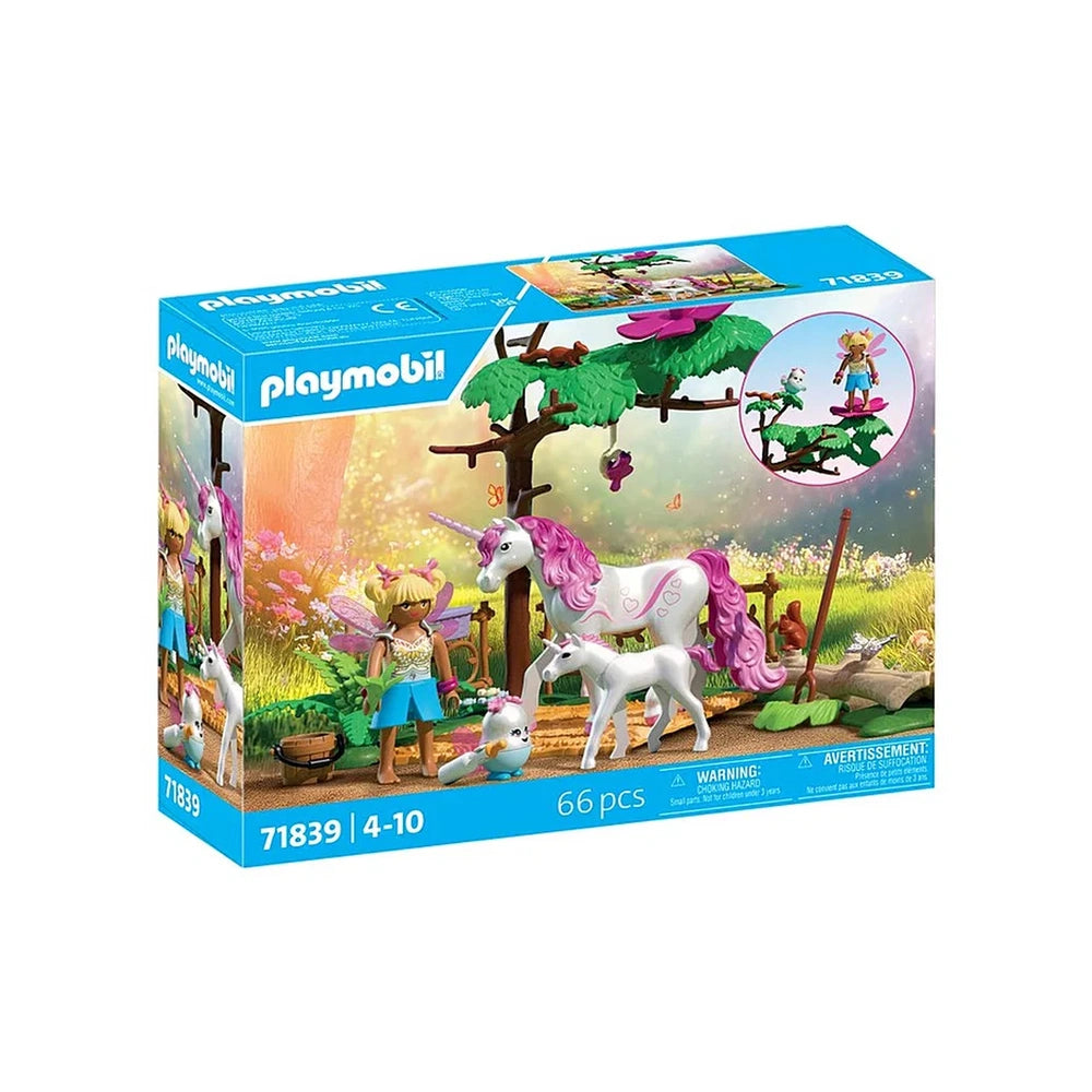 Playmobil Magical Unicorn Stable playset features pink and purple unicorns, greenery, and a rider in a colorful box design.