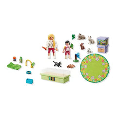 Playmobil Rabbit Family Playsets featuring colorful plastic toys in a cardboard package with a green circular object.