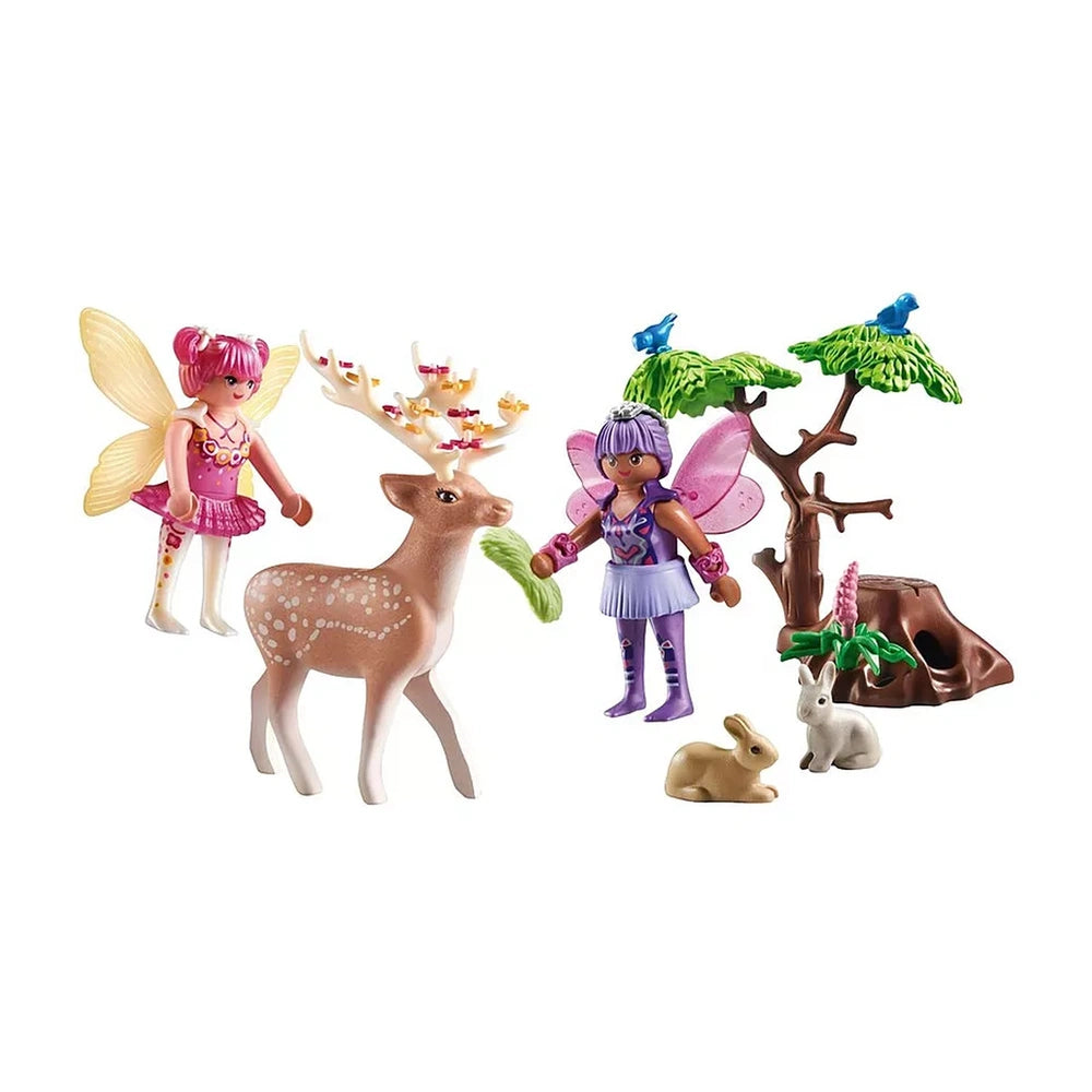 Playmobil Princess Magic toy playset featuring figures in pink and purple dresses, a deer, bunny, and tree in a grassy area.
