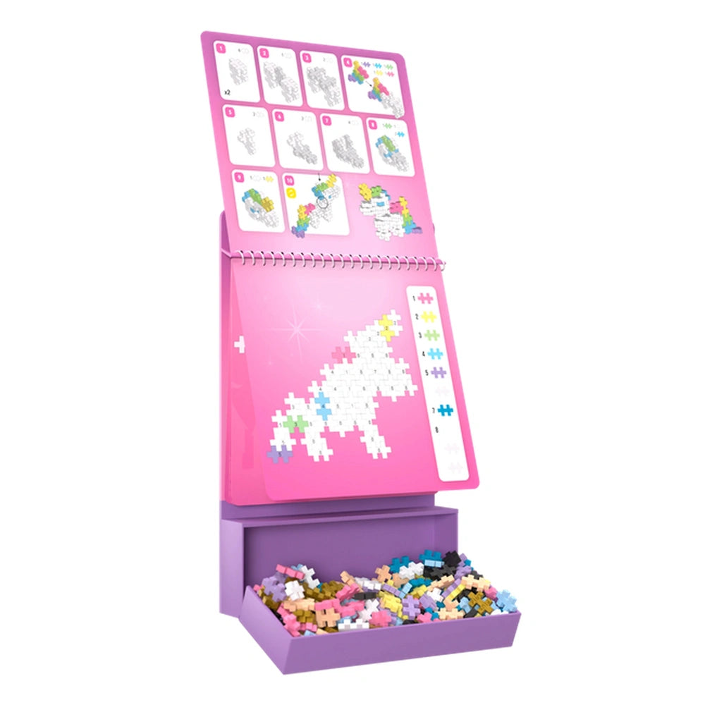 Plus Plus Fairytale Activity Pad features a smooth pink surface with glossy finish and white numbers 1-17 for puzzles.