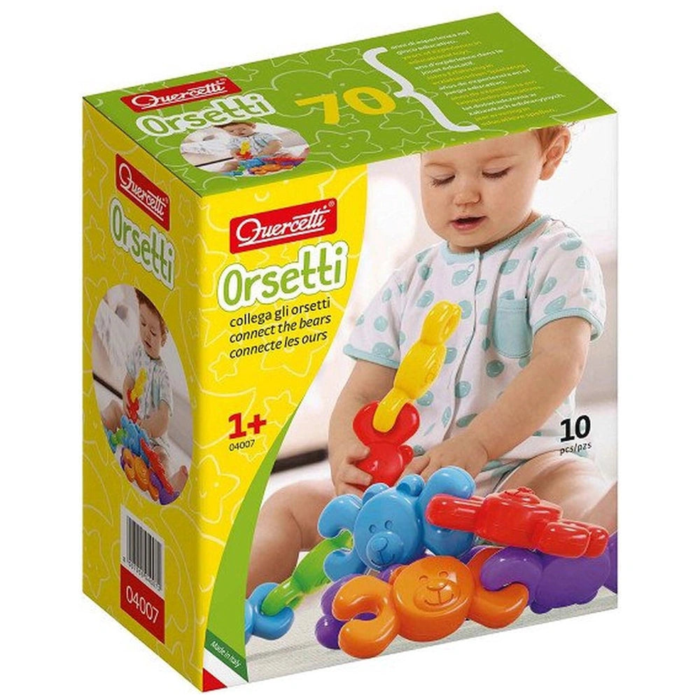 Quercetti Orsetti baby activity toy features a smiling bear in blue, orange, and purple on green cardboard packaging.