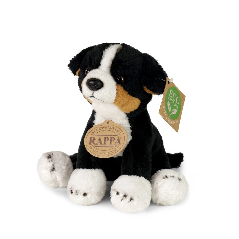 Rappa plush dog, 14cm, black and white with a brown patch, features a tag with "RAPPA" and a green leaf symbol.