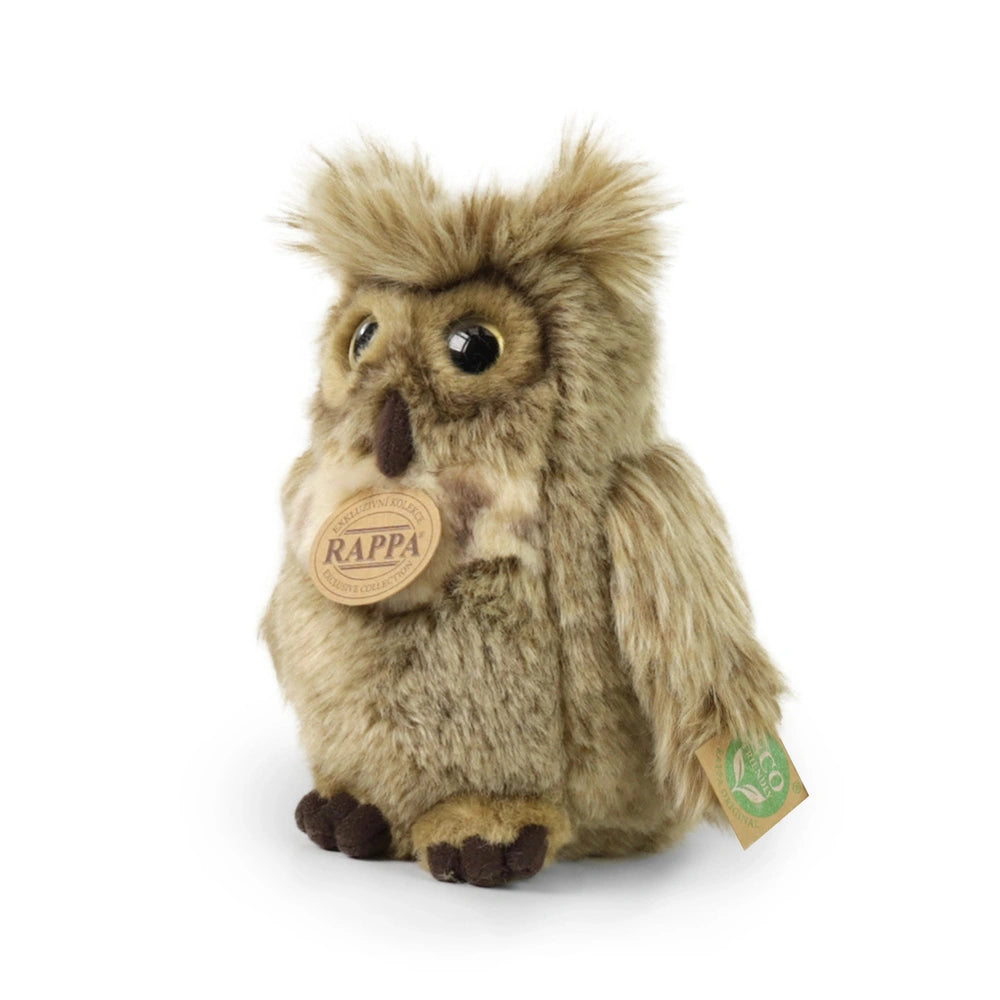Plush eagle-owl in light and dark brown, featuring a green and white tag with "RAPPA" and a leaf design, made from soft mater