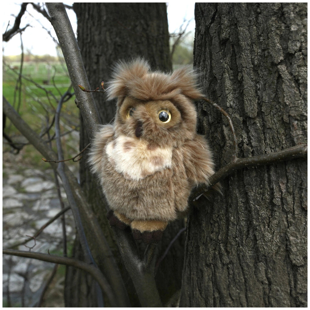 Rappa plush eagle-owl 17 cm, eco-friendly, perched on a brown tree branch with fuzzy, soft materials.
