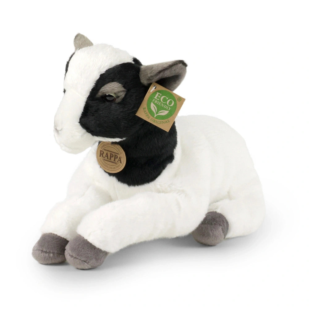 Rappa plush goat 30 cm with white and black fur, featuring an eco-friendly tag with a green leaf symbol.