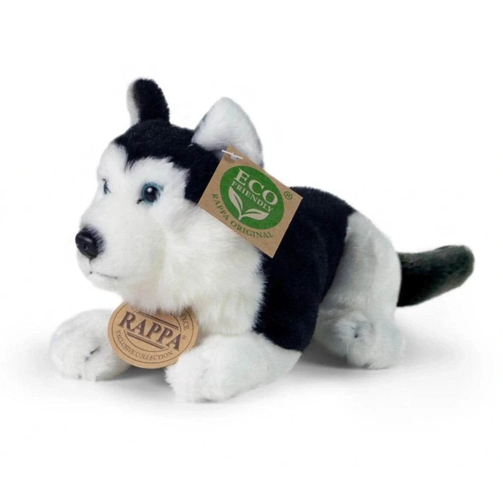 Plush husky dog stuffed animal with black and white fur, blue eyes, and a green and white eco-friendly tag.
