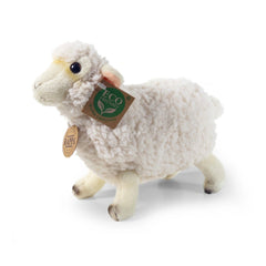 Plush sheep stuffed animal in soft white material with a brown eco-friendly tag, set against a plain light background.