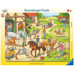 Ravensburger puzzle box features a vibrant farm scene with horses, dogs, chickens, and people engaging in rural activities.