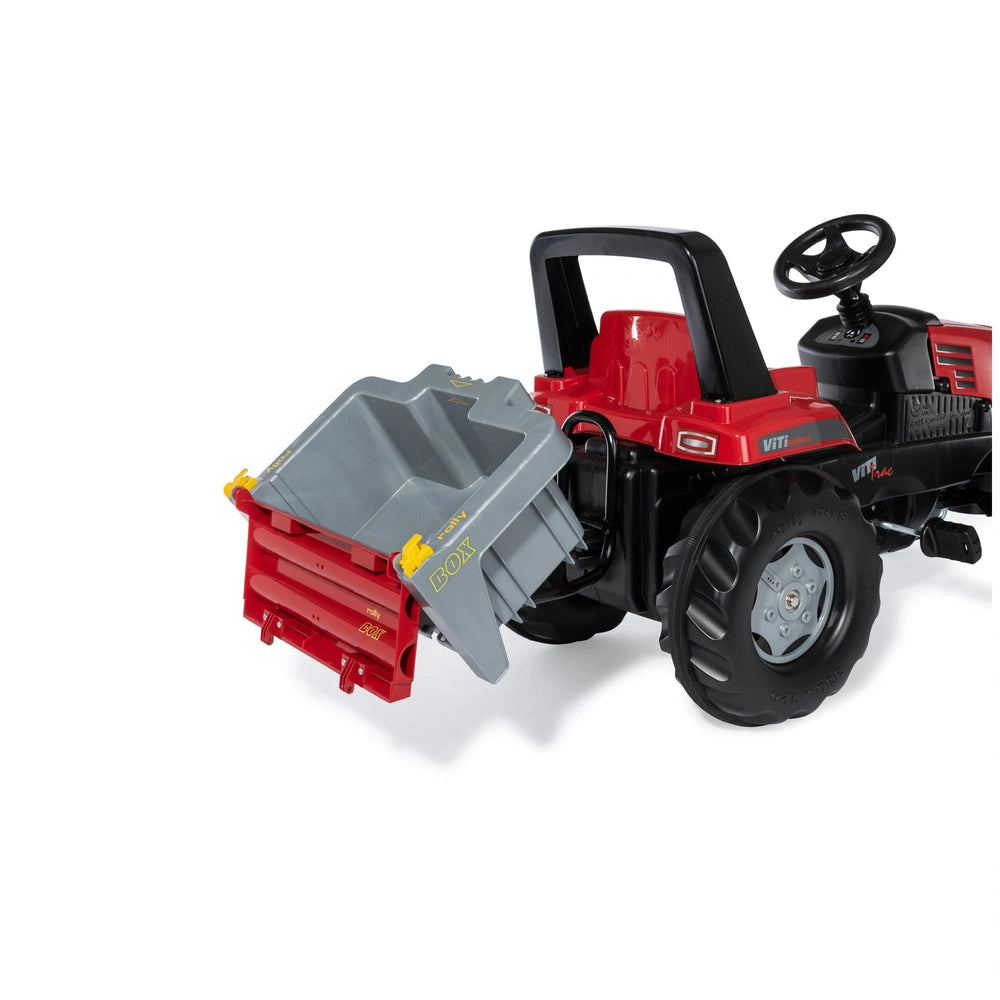 Rollybox John Deere toy tractor in red with black wheels, featuring a smooth plastic surface and a central focus against a li