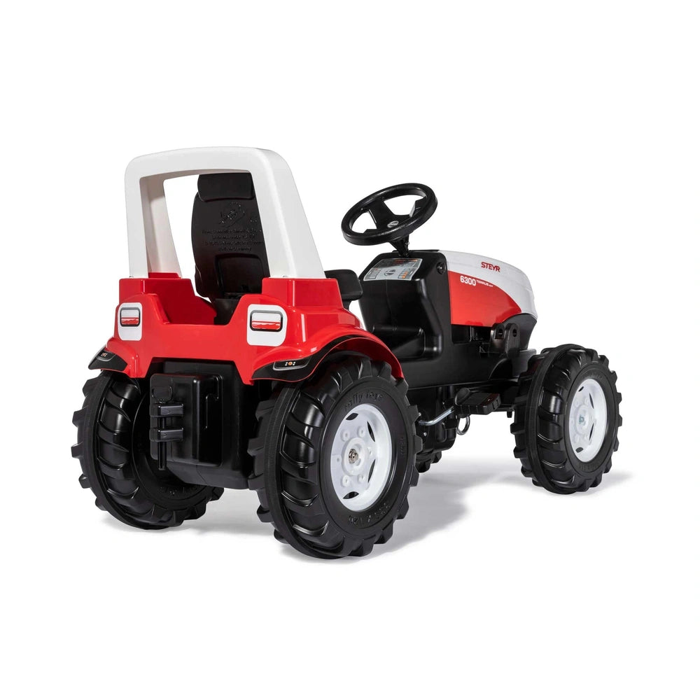 Rollyfarmtrac Premium II Steyr 6300 Terrus CVT toy tractor features a red and white design with black wheels and a child-frie