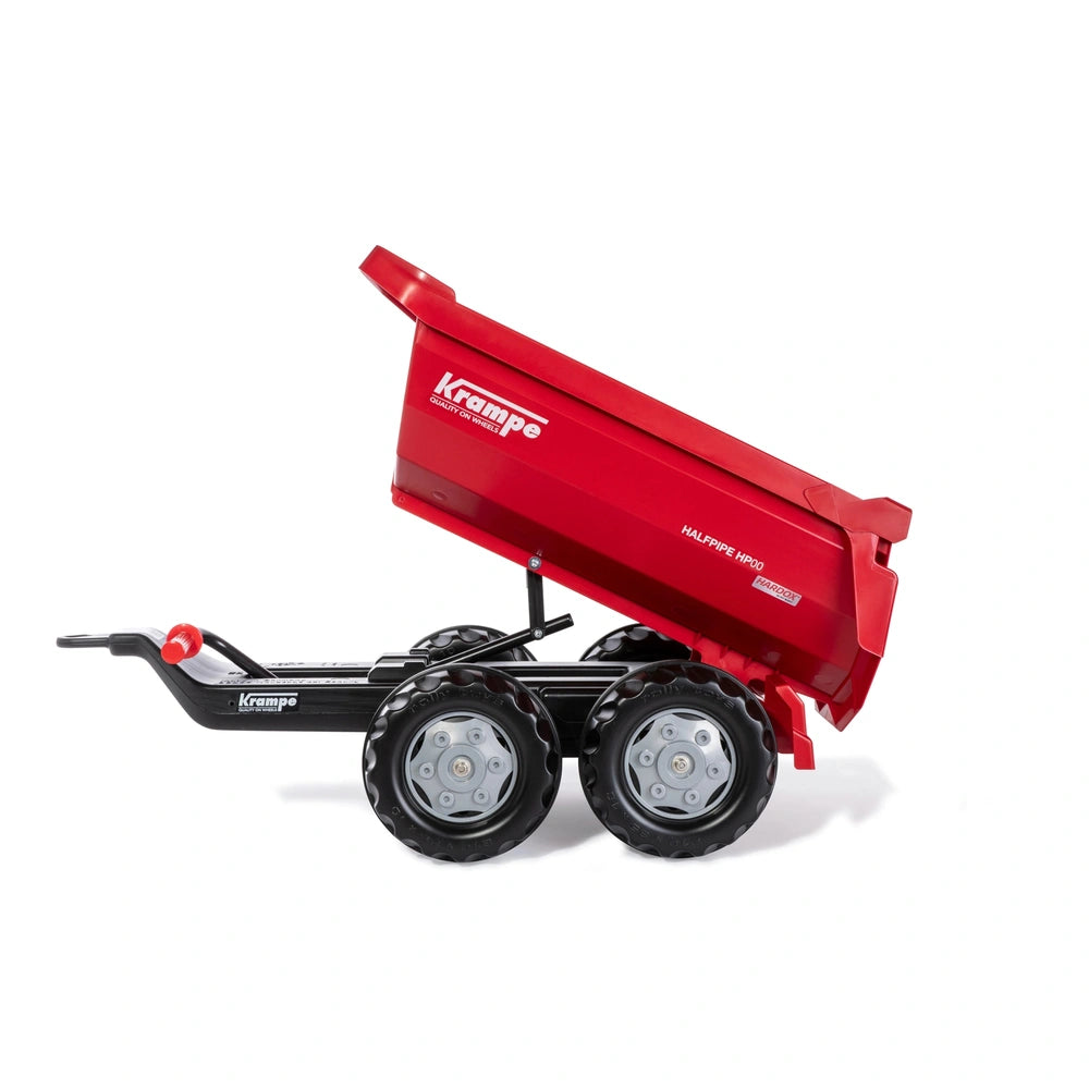 Red toy dump truck with black wheels and "KRAMPE" branding on the side, set against a white background.