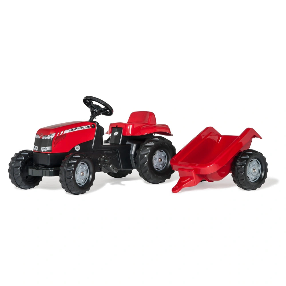 Red Rolly Toys tractor with glossy trailer, both featuring black tires and a matte finish.