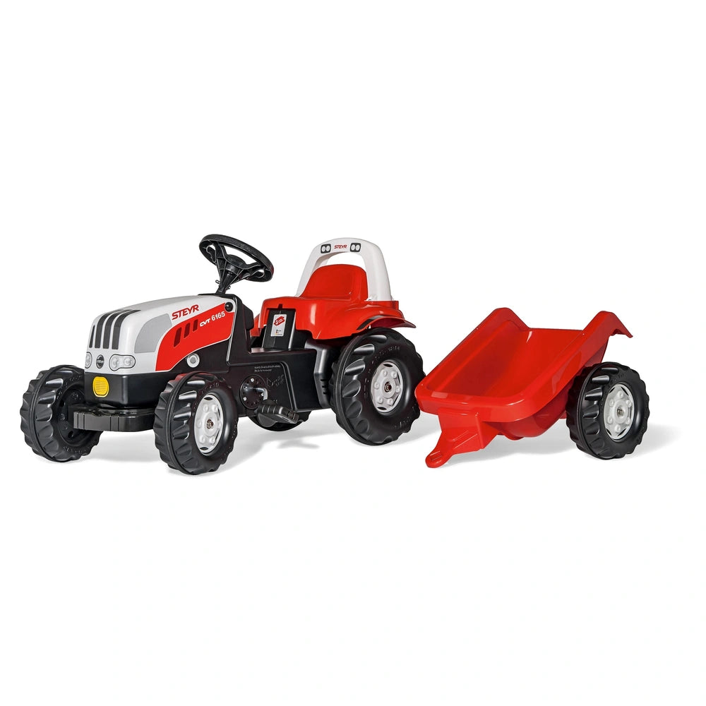 Rolly Toys Rollykid Steyr 6165 CVT tractor in red and black with a matching trailer, featuring black wheels and red seat.