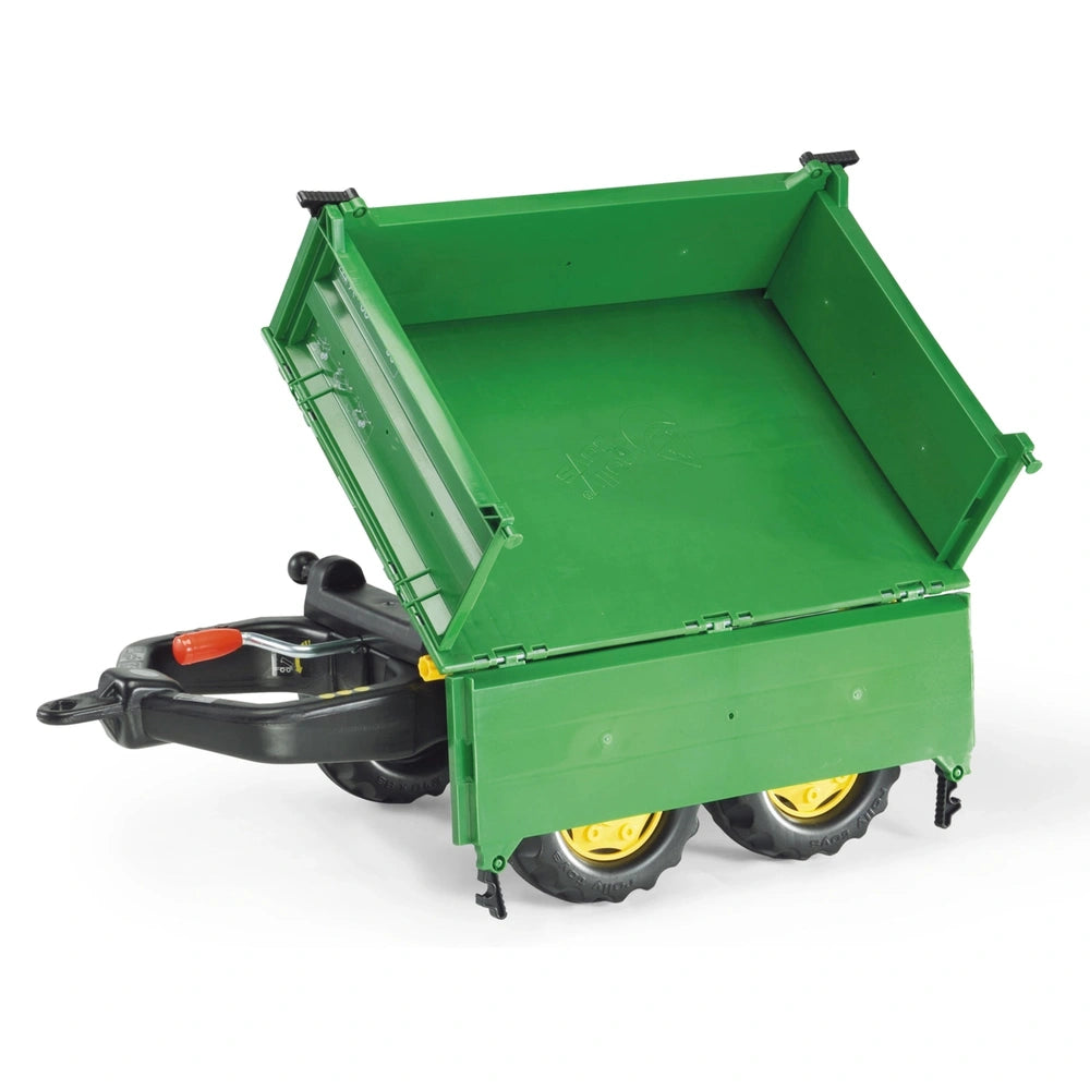 Rollymega Green Trailer features a green plastic body, black base, and yellow wheels, designed for riding fun.
