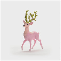 Pink magic deer figure with green antlers, smooth surface, four legs, and black eyes from Schleich Bayala.
