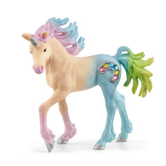 Schleich Marshmallow Unicorn Foal features a pale pink body, glossy mane, and vibrant green tail with glittery accents.