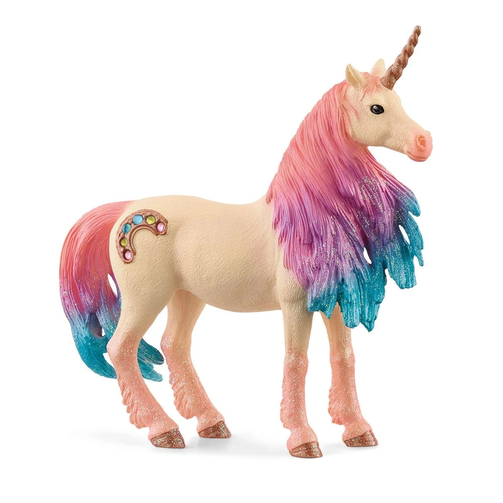 Bayala Marshmallow Unicorn toy figure with a cream body, pink and blue mane, and glossy tail, made of plastic-like material.